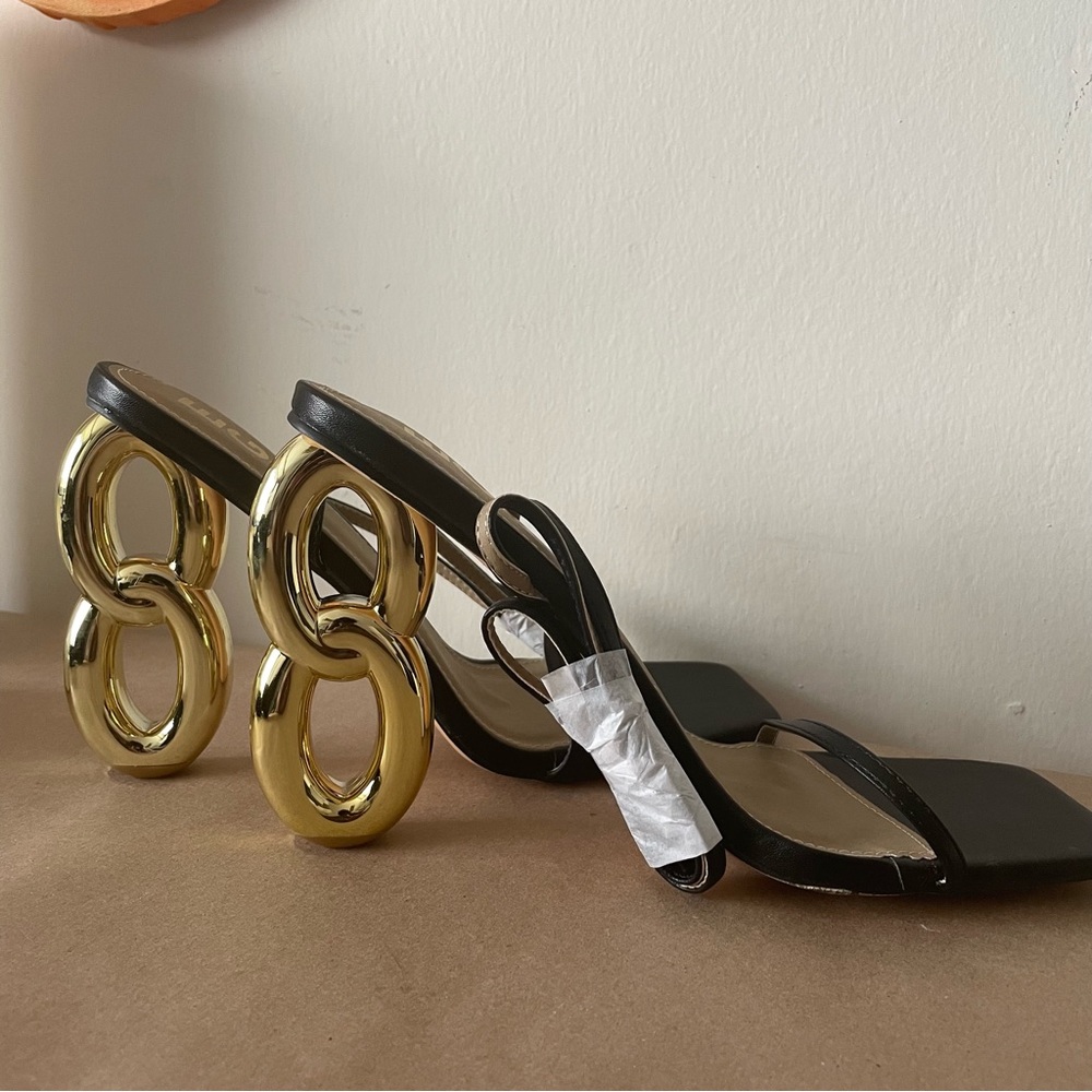 Black and gold chain heel